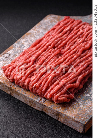 Raw minced beef or pork, ground meat for burgers. Raw minced meat Raw minced beef or pork, ground meat for burgers. Raw minced meat 132348018