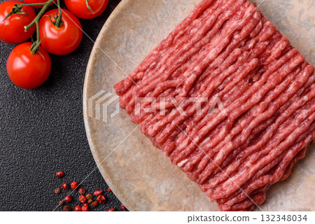 Raw minced beef or pork, ground meat for burgers. Raw minced meat Raw minced beef or pork, ground meat for burgers. Raw minced meat 132348034