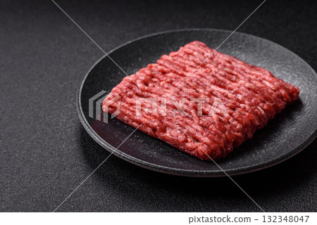 Raw minced beef or pork, ground meat for burgers. Raw minced meat Raw minced beef or pork, ground meat for burgers. Raw minced meat 132348047