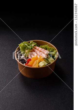 Bowl with shrimps, seafood, rice, oranges, tomatoes with sauce. Bowl with prawns Bowl with shrimps, seafood, rice, oranges, tomatoes with sauce. Bowl with prawns 132348067