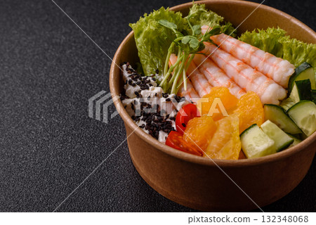 Bowl with shrimps, seafood, rice, oranges, tomatoes with sauce. Bowl with prawns Bowl with shrimps, seafood, rice, oranges, tomatoes with sauce. Bowl with prawns 132348068