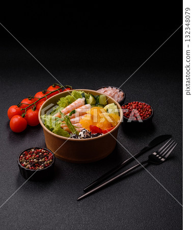 Bowl with shrimps, seafood, rice, oranges, tomatoes with sauce. Bowl with prawns Bowl with shrimps, seafood, rice, oranges, tomatoes with sauce. Bowl with prawns 132348079
