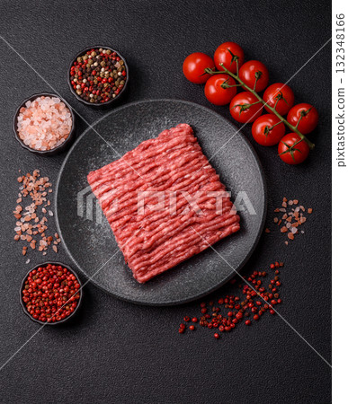 Raw minced beef or pork, ground meat for burgers. Raw minced meat Raw minced beef or pork, ground meat for burgers. Raw minced meat 132348166