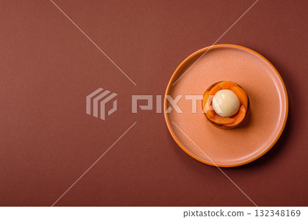 Pie, sweet round tart with apricot pieces, cream and nuts. Sweet tart with peach Pie, sweet round tart with apricot pieces, cream and nuts. Sweet tart with peach 132348169