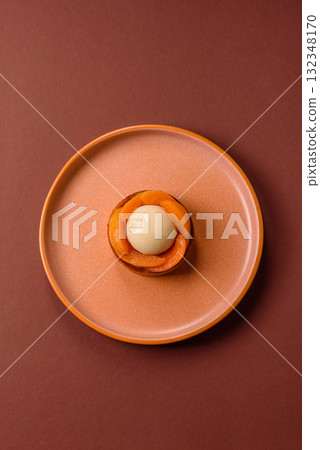 Pie, sweet round tart with apricot pieces, cream and nuts. Sweet tart with peach Pie, sweet round tart with apricot pieces, cream and nuts. Sweet tart with peach 132348170