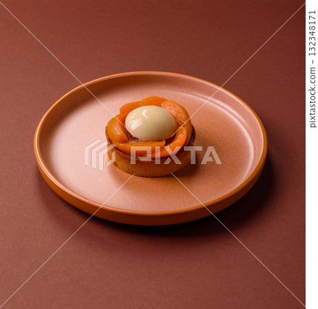 Pie, sweet round tart with apricot pieces, cream and nuts. Sweet tart with peach Pie, sweet round tart with apricot pieces, cream and nuts. Sweet tart with peach 132348171