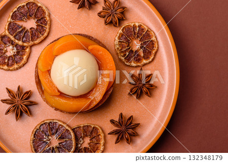 Pie, sweet round tart with apricot pieces, cream and nuts. Sweet tart with peach Pie, sweet round tart with apricot pieces, cream and nuts. Sweet tart with peach 132348179