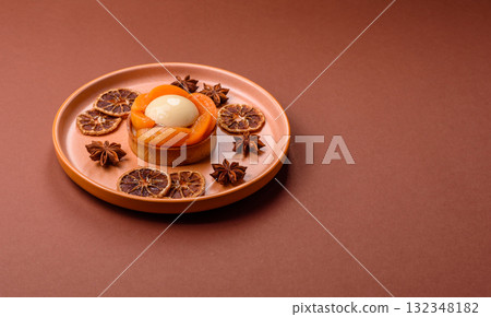 Pie, sweet round tart with apricot pieces, cream and nuts. Sweet tart with peach Pie, sweet round tart with apricot pieces, cream and nuts. Sweet tart with peach 132348182