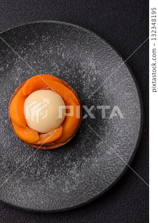 Pie, sweet round tart with apricot pieces, cream and nuts. Sweet tart with peach Pie, sweet round tart with apricot pieces, cream and nuts. Sweet tart with peach 132348195
