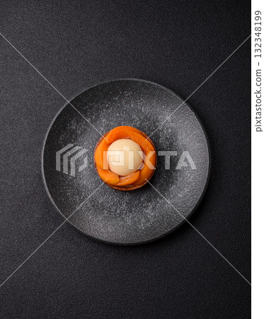 Pie, sweet round tart with apricot pieces, cream and nuts. Sweet tart with peach 132348199