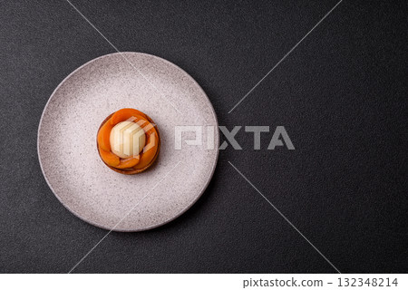 Pie, sweet round tart with apricot pieces, cream and nuts. Sweet tart with peach Pie, sweet round tart with apricot pieces, cream and nuts. Sweet tart with peach 132348214