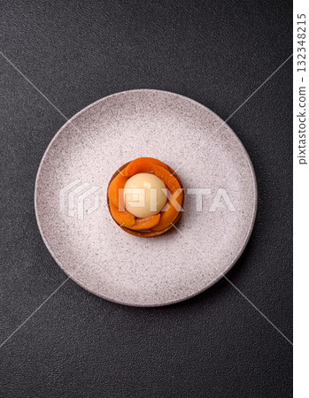 Pie, sweet round tart with apricot pieces, cream and nuts. Sweet tart with peach Pie, sweet round tart with apricot pieces, cream and nuts. Sweet tart with peach 132348215