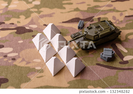 Anti-tank barrier or dragon's teeth made of concrete and iron as a fortification. Dragon's teeth 132348282