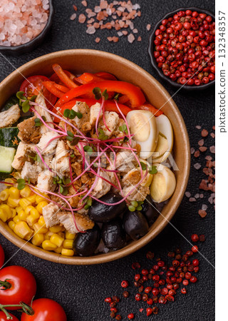 Bowl with chicken pieces, rice, tomatoes, peppers and microgreens. Bowl with chicken Bowl with chicken pieces, rice, tomatoes, peppers and microgreens. Bowl with chicken 132348357