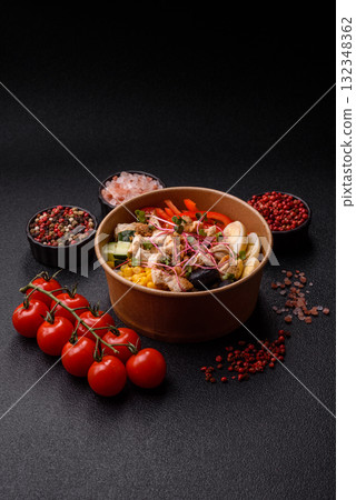 Bowl with chicken pieces, rice, tomatoes, peppers and microgreens. Bowl with chicken 132348362