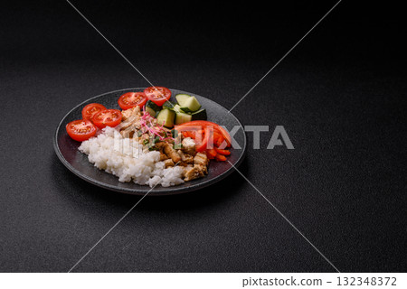 Bowl with chicken pieces, rice, tomatoes, peppers and microgreens. Bowl with chicken Bowl with chicken pieces, rice, tomatoes, peppers and microgreens. Bowl with chicken 132348372