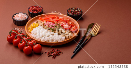 Bowl with chicken pieces, rice, tomatoes, peppers and microgreens. Bowl with chicken Bowl with chicken pieces, rice, tomatoes, peppers and microgreens. Bowl with chicken 132348388