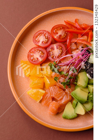 Bowl with salmon pieces, cheese, tomatoes, peppers and avocado. Salmon bowl Bowl with salmon pieces, cheese, tomatoes, peppers and avocado. Salmon bowl 132348429