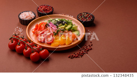 Bowl with salmon pieces, cheese, tomatoes, peppers and avocado. Salmon bowl Bowl with salmon pieces, cheese, tomatoes, peppers and avocado. Salmon bowl 132348435