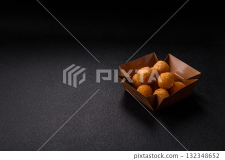 Cheese balls, croquettes or arancini with potatoes or rice. Cheese balls 132348652