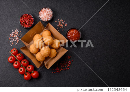 Cheese balls, croquettes or arancini with potatoes or rice. Cheese balls 132348664