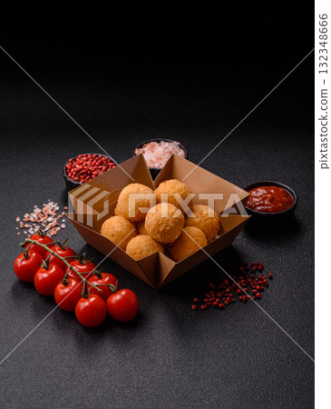 Cheese balls, croquettes or arancini with potatoes or rice. Cheese balls 132348666