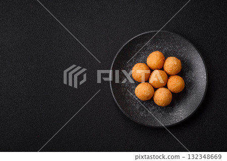 Cheese balls, croquettes or arancini with potatoes or rice. Cheese balls 132348669
