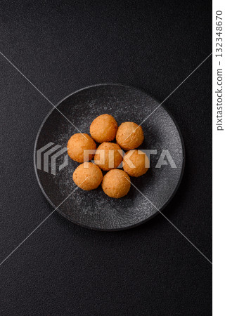 Cheese balls, croquettes or arancini with potatoes or rice. Cheese balls Cheese balls, croquettes or arancini with potatoes or rice. Cheese balls 132348670