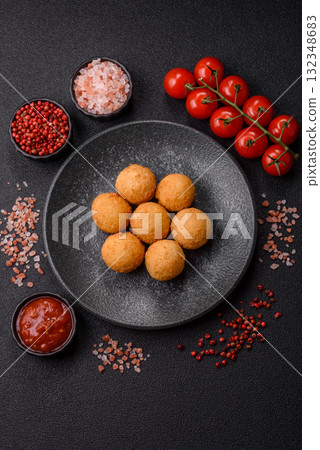 Cheese balls, croquettes or arancini with potatoes or rice. Cheese balls Cheese balls, croquettes or arancini with potatoes or rice. Cheese balls 132348683