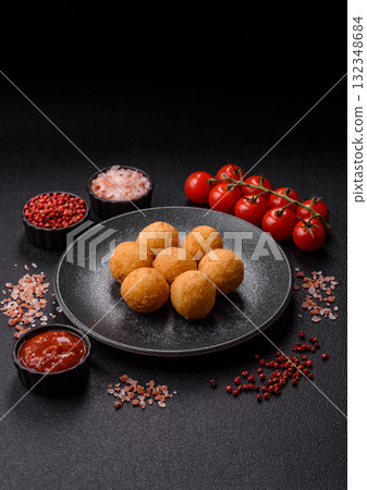 Cheese balls, croquettes or arancini with potatoes or rice. Cheese balls Cheese balls, croquettes or arancini with potatoes or rice. Cheese balls 132348684