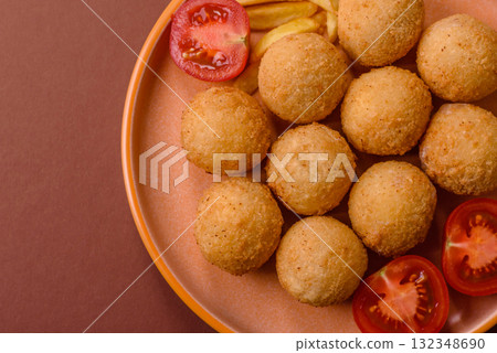 Cheese balls, croquettes or arancini with potatoes or rice. Cheese balls Cheese balls, croquettes or arancini with potatoes or rice. Cheese balls 132348690