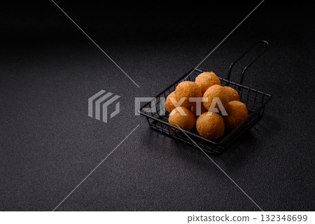 Cheese balls, croquettes or arancini with potatoes or rice. Cheese balls Cheese balls, croquettes or arancini with potatoes or rice. Cheese balls 132348699