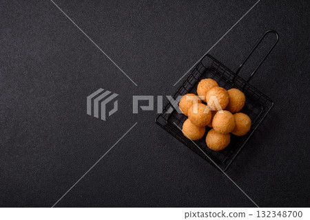 Cheese balls, croquettes or arancini with potatoes or rice. Cheese balls Cheese balls, croquettes or arancini with potatoes or rice. Cheese balls 132348700