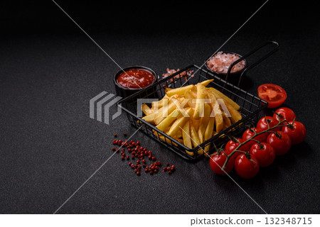 French fries, chips or snack with sauce as food background. French fries 132348715