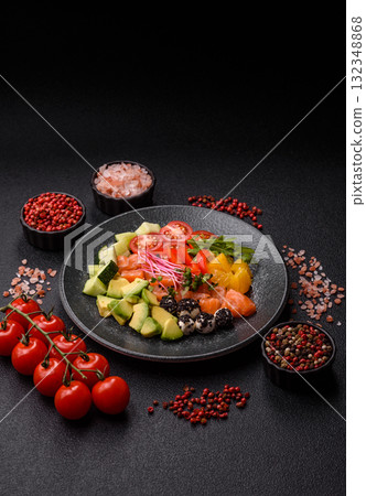 Bowl with salmon pieces, cheese, tomatoes, peppers and avocado. Salmon bowl Bowl with salmon pieces, cheese, tomatoes, peppers and avocado. Salmon bowl 132348868