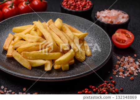 French fries, chips or snack with sauce as food background. French fries French fries, chips or snack with sauce as food background. French fries 132348869