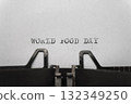 typed words on a vintage typewriter world food day  132349250