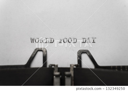 typed words on a vintage typewriter world food day  132349250