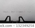 world development day typed words on a vintage typewriter 132349258
