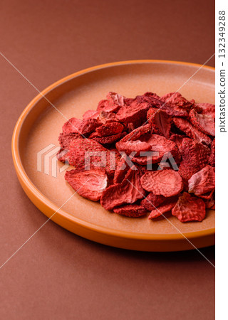 Dried sublimated slices of strawberry as an ingredient for sweet desserts. Dried strawberry Dried sublimated slices of strawberry as an ingredient for sweet desserts. Dried strawberry 132349288