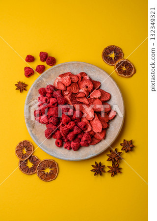 Dried sublimated slices of strawberry and raspberry as an ingredient for desserts. Dried strawberry 132349321