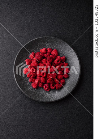 Dried sublimated slices of raspberry as an ingredient for sweet desserts. Dried raspberry 132349325