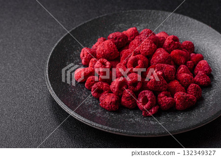 Dried sublimated slices of raspberry as an ingredient for sweet desserts. Dried raspberry Dried sublimated slices of raspberry as an ingredient for sweet desserts. Dried raspberry 132349327