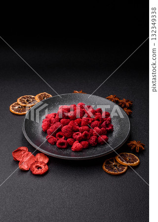 Dried sublimated slices of raspberry as an ingredient for sweet desserts. Dried raspberry 132349338