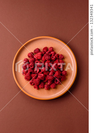 Dried sublimated slices of raspberry as an ingredient for sweet desserts. Dried raspberry Dried sublimated slices of raspberry as an ingredient for sweet desserts. Dried raspberry 132349341