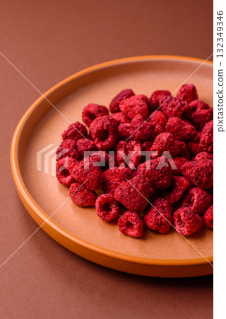 Dried sublimated slices of raspberry as an ingredient for sweet desserts. Dried raspberry Dried sublimated slices of raspberry as an ingredient for sweet desserts. Dried raspberry 132349346