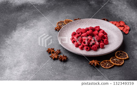 Dried sublimated slices of raspberry as an ingredient for sweet desserts. Dried raspberry 132349359