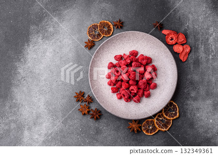 Dried sublimated slices of raspberry as an ingredient for sweet desserts. Dried raspberry 132349361