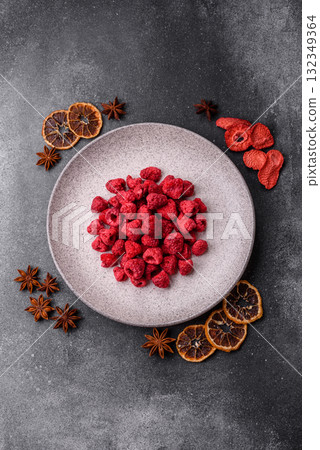 Dried sublimated slices of raspberry as an ingredient for sweet desserts. Dried raspberry Dried sublimated slices of raspberry as an ingredient for sweet desserts. Dried raspberry 132349364
