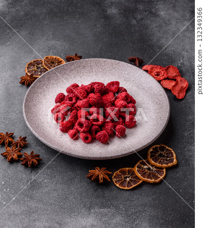 Dried sublimated slices of raspberry as an ingredient for sweet desserts. Dried raspberry 132349366